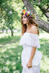 Beautiful bride in white wedding dress.