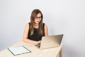 Naklejka premium business concept - businesswoman working on laptop in the office