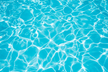 Blue water surface in swimming pool for background