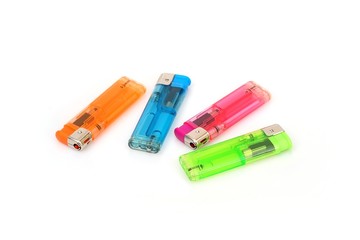 Multi-colored plastic lighters isolated on a white background
