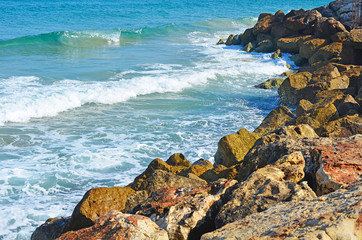Sea waves break stones northern Israel