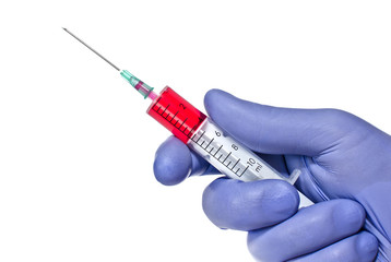 Hand in glove with syringe isolated on a white background