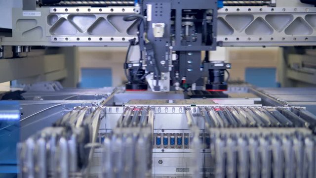 Electronic circuit board production line at modern science lab. 4K.