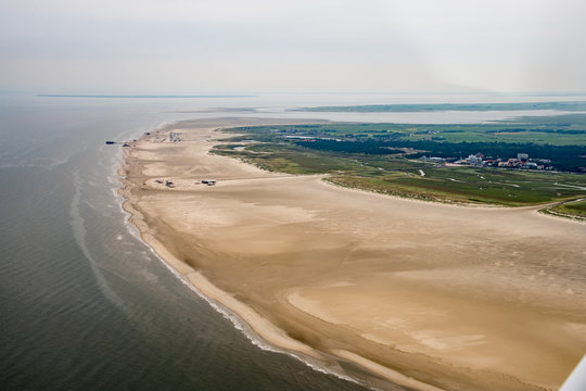Panorama flight over the Elbe River and the west coast of Germany, with the Kiel-Canal and the Cities of Buesum and St. Peter-Ording