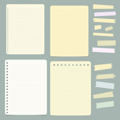 Set of blank ruled notepaper sheets and collection of various pieces sticky tape on grey background
