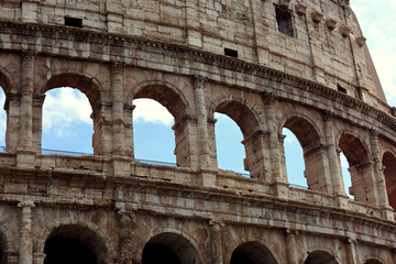 Obraz premium Closeup portrait of Coliseum building old wall with arch in Rome, Italy