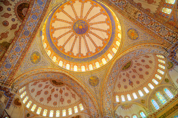 blue mosque in Istanbul, a lot of sunlight penetrates through the windows in the domes
