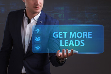 Business, Technology, Internet and network concept. Young businessman working on a virtual screen of the future and sees the inscription: Get more leads