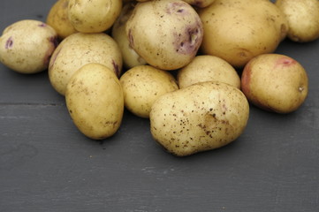 potatoes on a wooden table