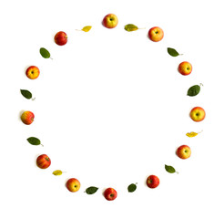 Ripe yellow red juicy apples and leaves apple tree on white background with space for text. Top view, flat lay