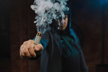 Man vaping an electronic cigarette