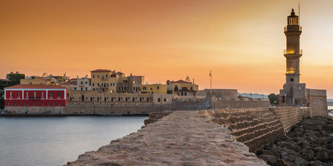 The Venetian Harbor and the Lighthouse of Chania Old Town During Sunset on the Greek Island of Crete