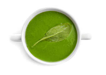 Tureen with spinach soup, isolated on white