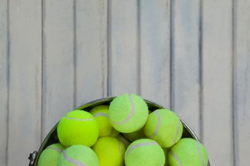 Directly above view of fluorescent yellow tennis balls in