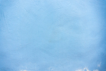 Textures of pastel blue painted grunge concrete background