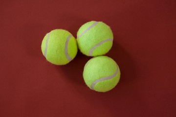 Overhead view of three tennis balls