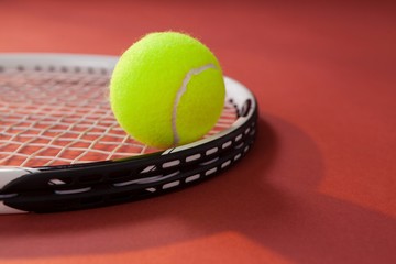 Close up of tennis ball on racket