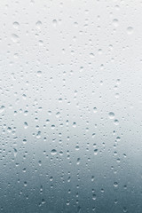 Light rain on the window glass,