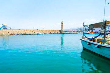 Fototapeta na wymiar The lighthouse of the Venetian harbor of Rethymno