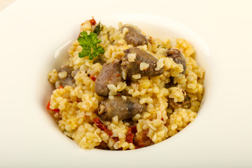 Bulgur with chicken hearts
