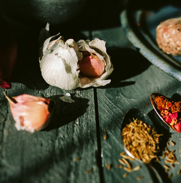 Garlic and spices. Square image.