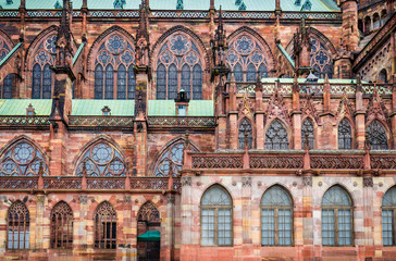 Fototapeta na wymiar Huge tower and elegant exterior architecture of Notre dam of Strasbourg cathedral in Strasbourg, France