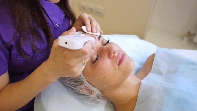 Ultrasound cavitation, face skin cleansing at beauty salon