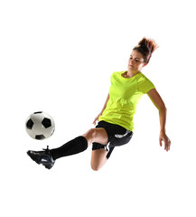 Fototapeta premium Young Soccer Player Kicking Ball