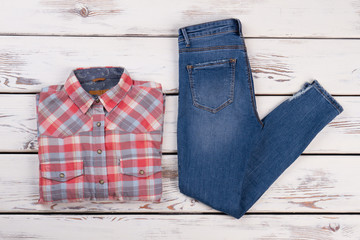 Checkered shirt and jeans