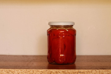 Jar with red peppers