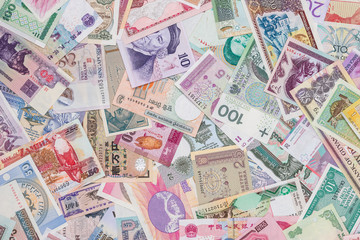 world paper money as background. close up