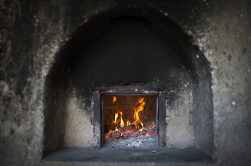 Fototapeta premium Fire wood burning in the oven