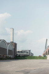 Old industrial area of Nijmegen with buildings and new bridge.