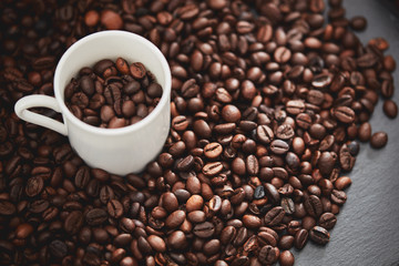 Coffee cup with coffee beans