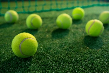 Close up of tennis balls on court