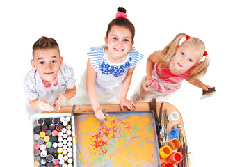 children draw drawing technique with ebru on white background