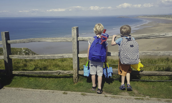 Two children on their way to the beach