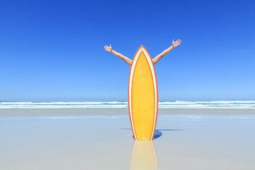 Surfboard with arms reaching for the sky.