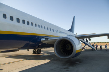 Passengers boarding on a plane