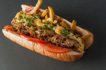 Big sandwich on a slate stone background