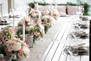 Luxury, elegant wedding reception table arrangement, floral centerpiece