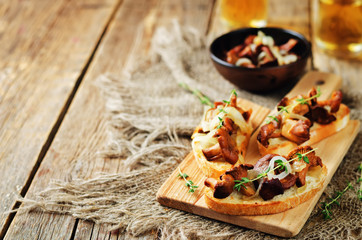 Fried chantarelle onion toasts