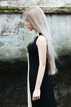 Portrait of a beautiful female model with long pastel hair