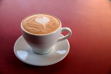 one cappuccino cup on table