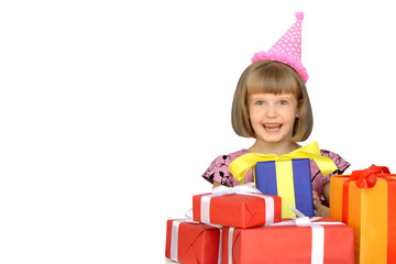 The happy child received gifts on birthday