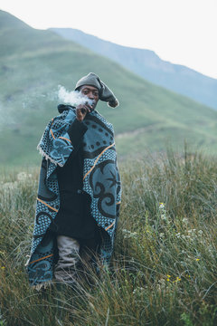 Portrait of a Basotho herdsman smoking