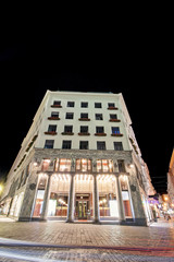 Low angle view of historic illuminated building at night between Graben, Stephansplatz and...