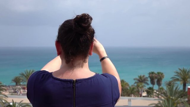 High quality video of woman making the picture on the vacations in real 1080p slow motion 120fps