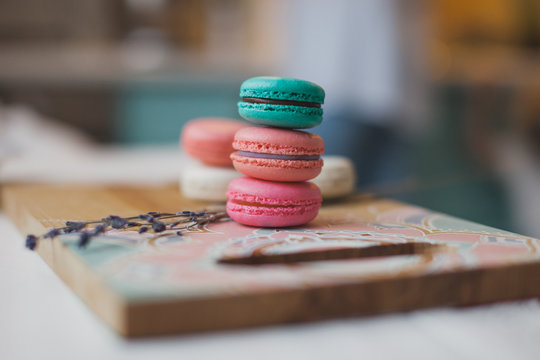 Macaroons on the painted cutting board