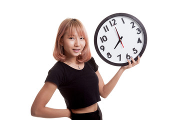 Young Asian woman with a clock.